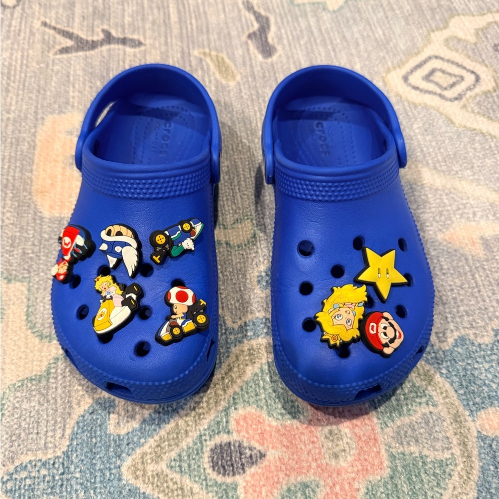 CROCS Kids Vibrant Blue Sandals with Mario And Kirby Jibbits $28